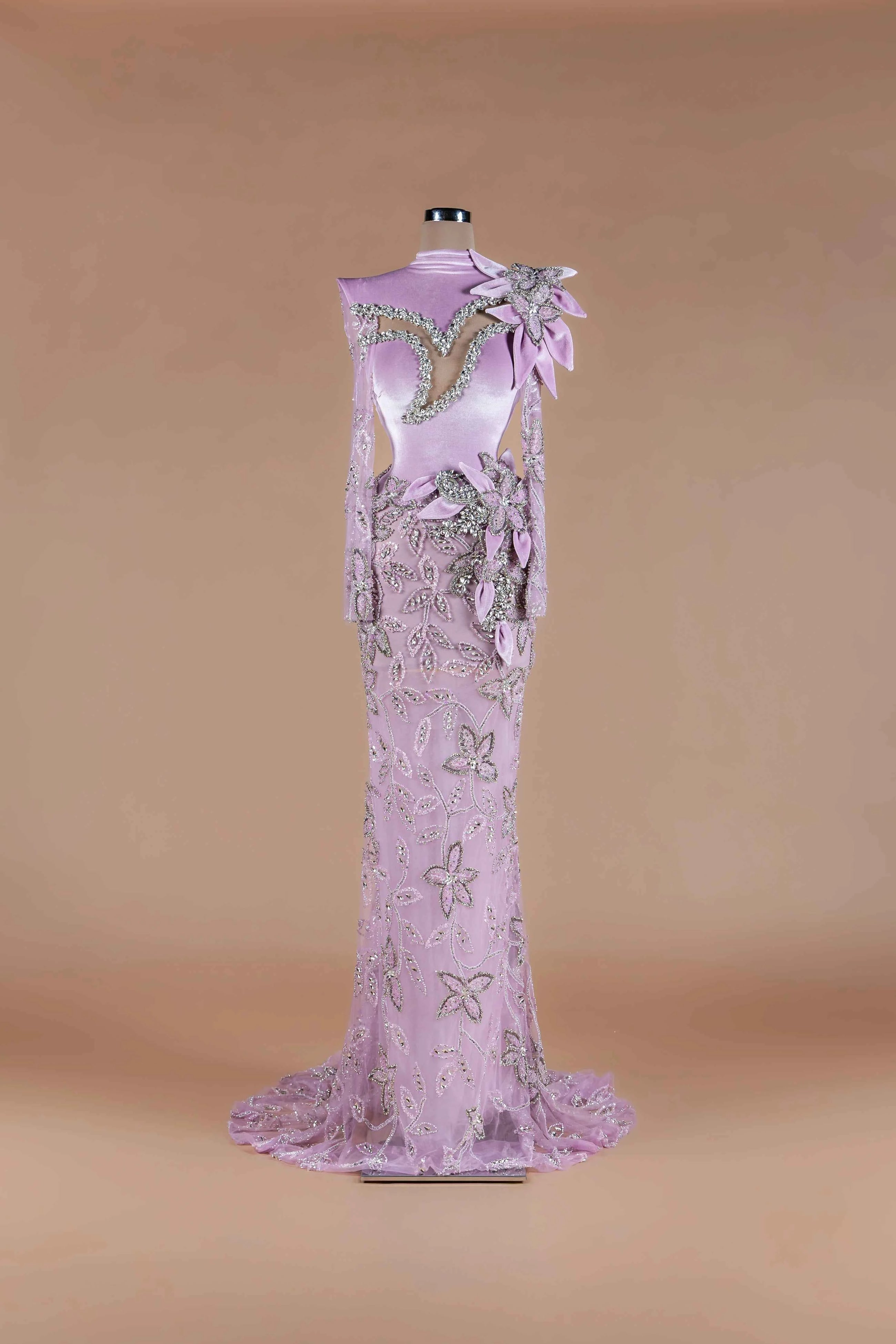 Sihëna Wisteria Vine — lilac high-neck long-sleeve velvet mermaid gown with crystal-bordered chest cutout and beaded vine motif.