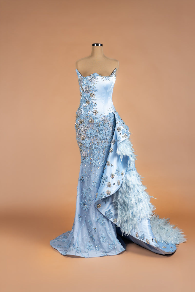 Sihëna Frostbloom Plume — powder-blue strapless satin mermaid gown with 3D florals, crystal-pearl beadwork and feather-trimmed train.