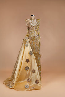 Sihëna Midas Rose Cascade — gold high-neck long-sleeve mermaid gown with crystal bodice, 3D rosettes and champagne satin overskirt.