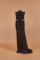 Sihëna Obsidian Cacao — chocolate high-neck long-sleeve sequin mermaid gown with sheer boned corset midriff and high slit.