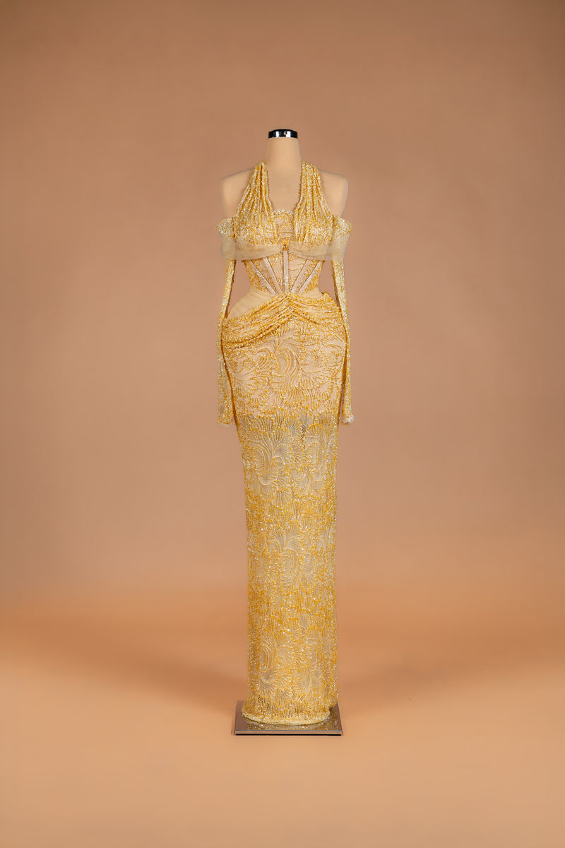 Sihëna Honeyed Lace — gold halter off-shoulder beaded-lace column gown with corset bodice and waist cutouts.