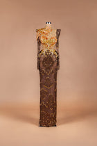 Sihëna Autumn Phoenix — chocolate high-neck long-sleeve illusion gown with gold beadwork, feather detail and beaded-lace skirt.