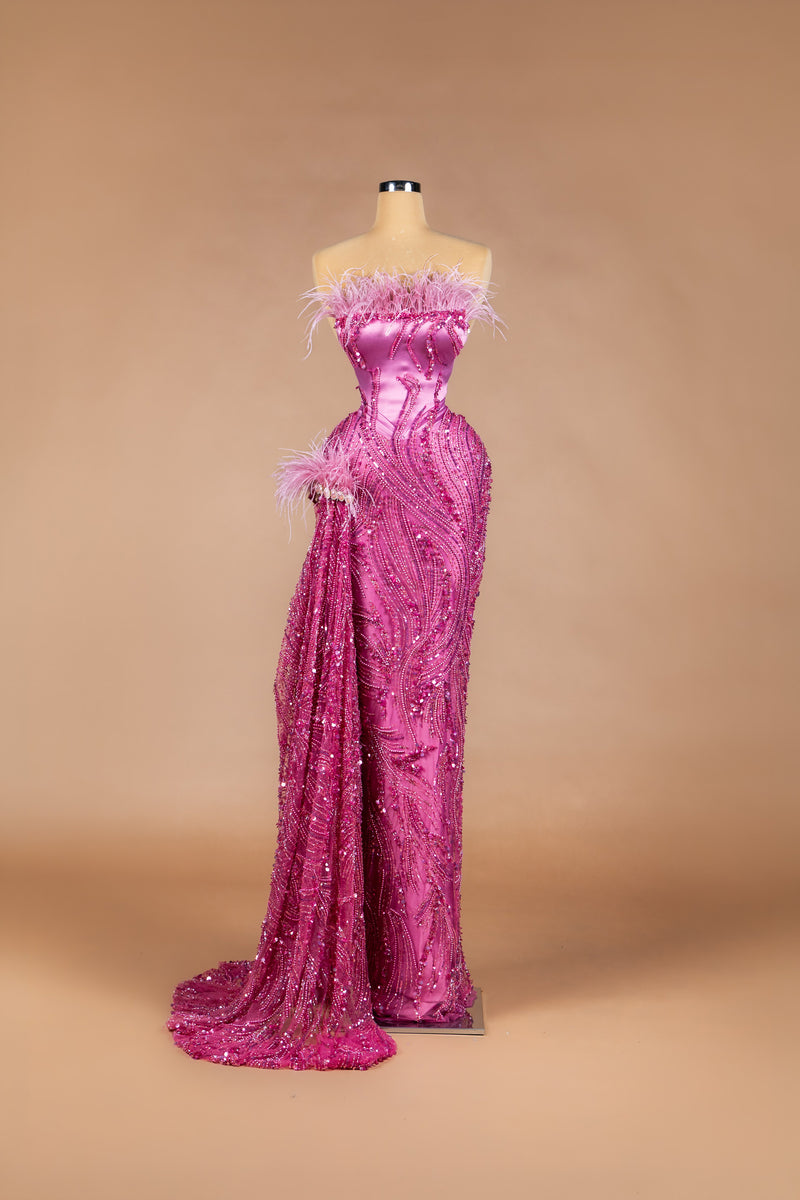 Sihëna Fuchsia Feather — fuchsia strapless satin mermaid gown with sequin swirls, feather trim and draped sash train.