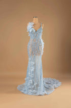 Sihëna Ice Blossom Symphony — powder-blue v-neck sleeveless mermaid gown with crystal beadwork on sheer net and powder-blue organza 3D florals.