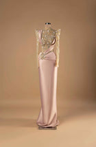 Sihëna Blush Imperial — blush high-neck long-sleeve column evening gown with crystal and opal-stone beadwork on illusion bodice and draped satin column skirt.