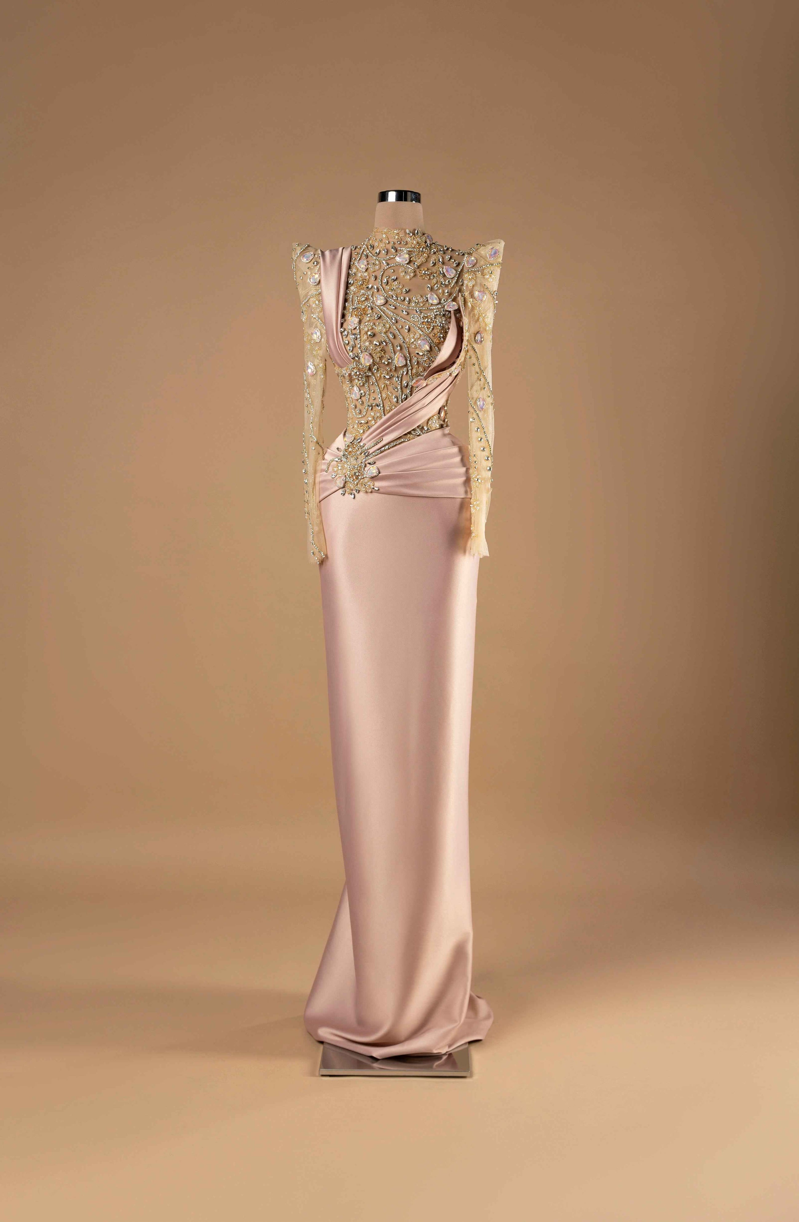 Sihëna Blush Imperial — blush high-neck long-sleeve column evening gown with crystal and opal-stone beadwork on illusion bodice and draped satin column skirt.