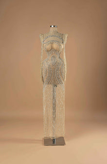 Sihëna Starlit Symphony — nude high-neck long-sleeve column evening gown in sheer crystal-beaded illusion tulle with an open chest cutout.