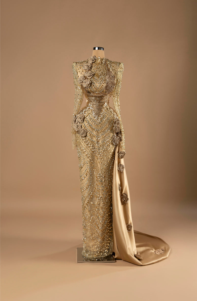 Sihëna Gilded Rose Empress — gold high-neck long-sleeve column gown with crystal-sequin beadwork and 3D-floral rosettes.