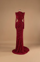 Sihëna Crimson Eclipse — burgundy high-neck long-sleeve sequin mermaid gown with ruched draping, a side cutout and a train.
