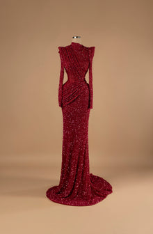 Sihëna Crimson Eclipse — burgundy high-neck long-sleeve sequin mermaid gown with ruched draping, a side cutout and a train.