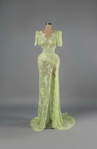 Sihëna Celadon Whisper — sage-green V-neck short-sleeve lace mermaid gown with sequin and pearl beadwork and a high slit.