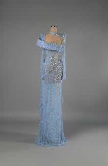 Sihëna Moonlit Tide — powder-blue one-shoulder long-sleeve column gown with pearl and crystal beadwork on sheer net.