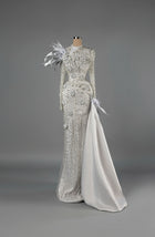 Sihëna Frosted Starlight — white high-neck long-sleeve mermaid gown with crystal-pearl beadwork and satin overskirt.