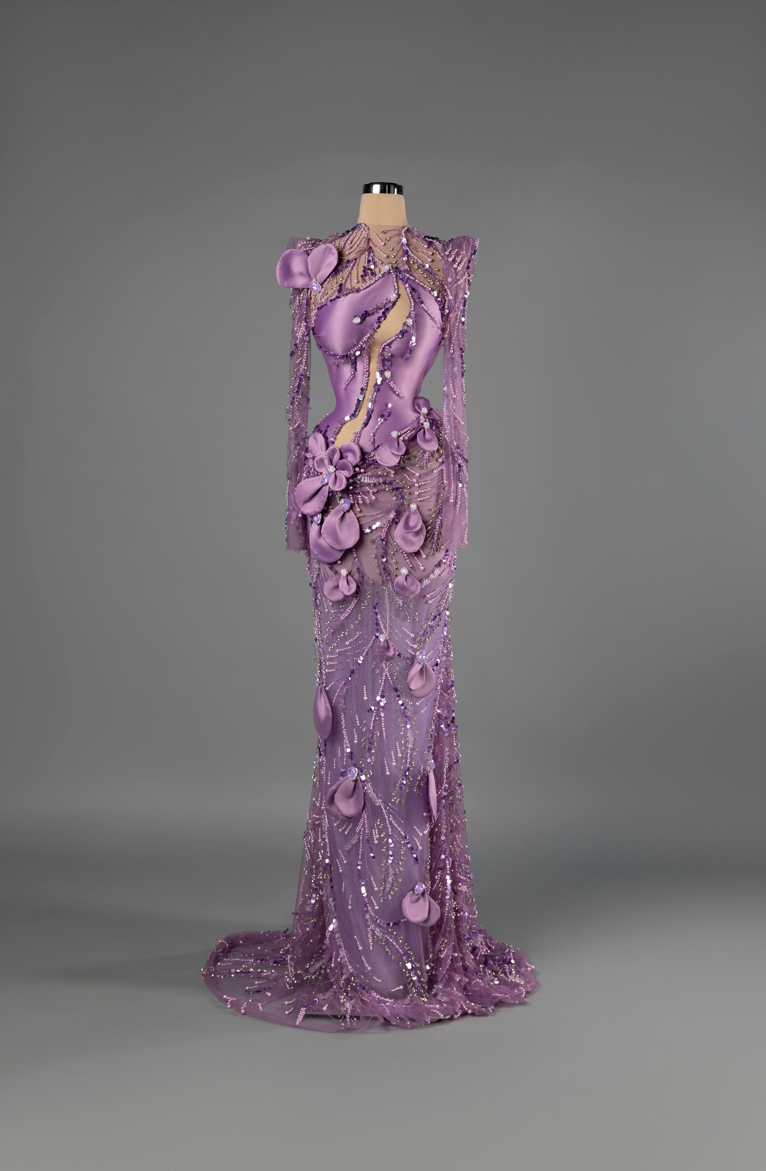 Sihëna Petal Chandelier — lilac high-neck long-sleeve mermaid gown with sculpted satin panels, 3D floral petals, pearl and sequin beadwork.