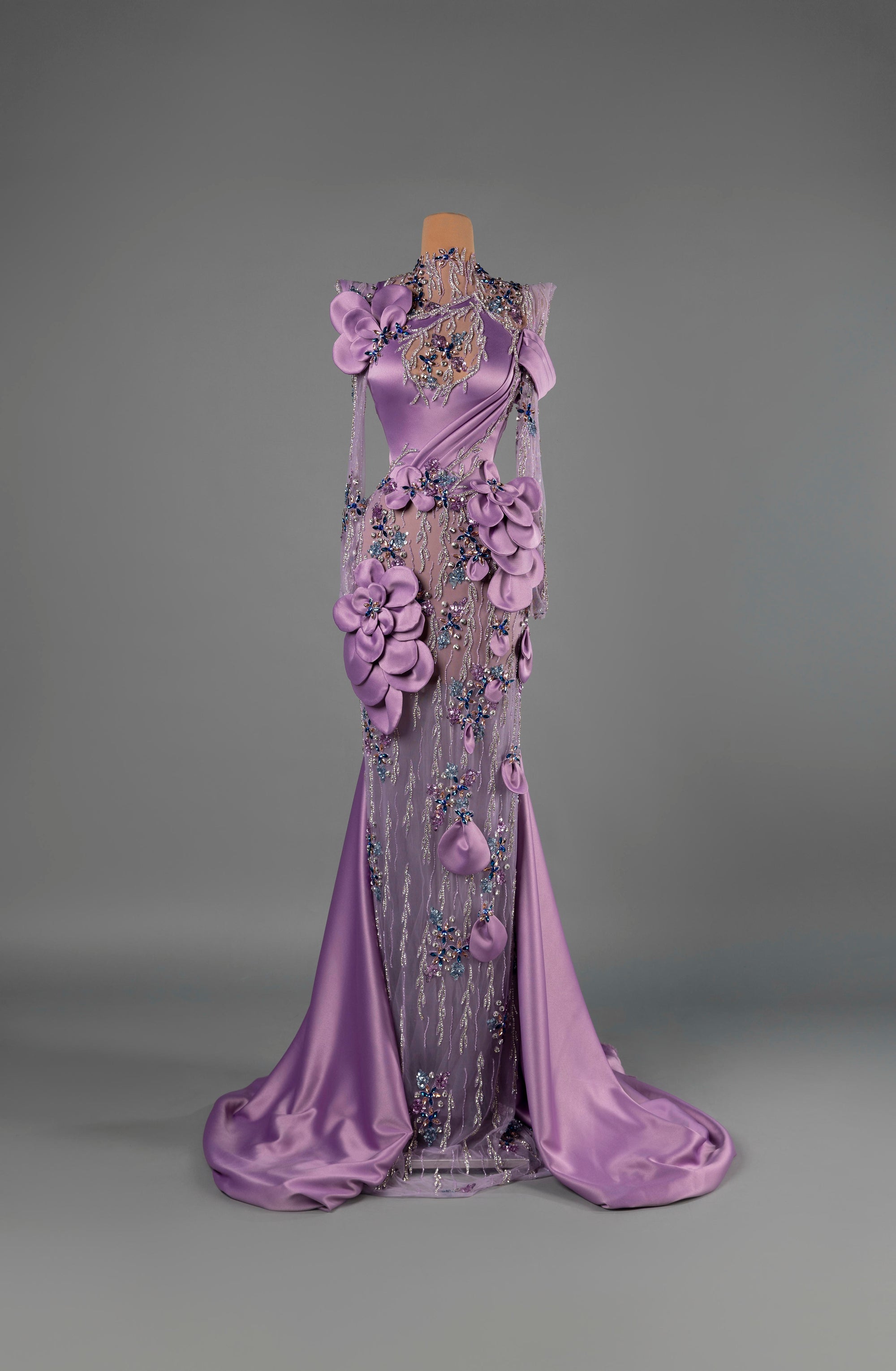 Sihëna Lavender Paragon — lilac high-neck long-sleeve mermaid gown in satin with 3D floral appliqué, crystal beadwork and satin train.