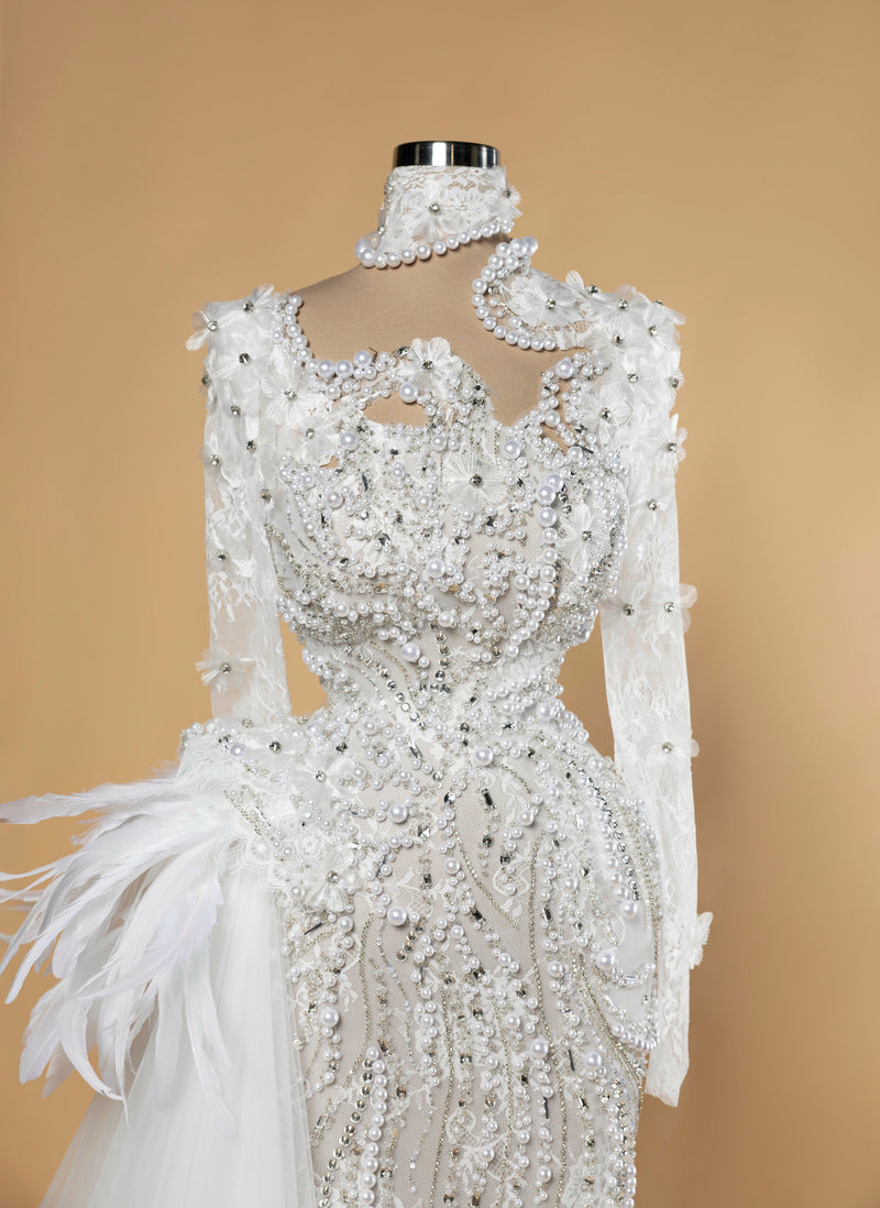 Sihëna Opal Wing Cascade — ivory high-neck long-sleeve mermaid wedding dress