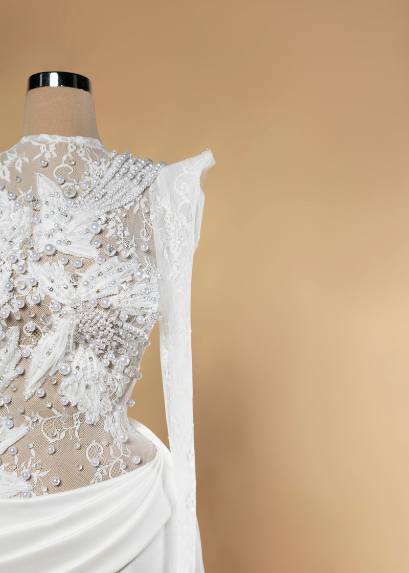 Sihëna Noor Draped Serenity — ivory high-neck long-sleeve column wedding dress