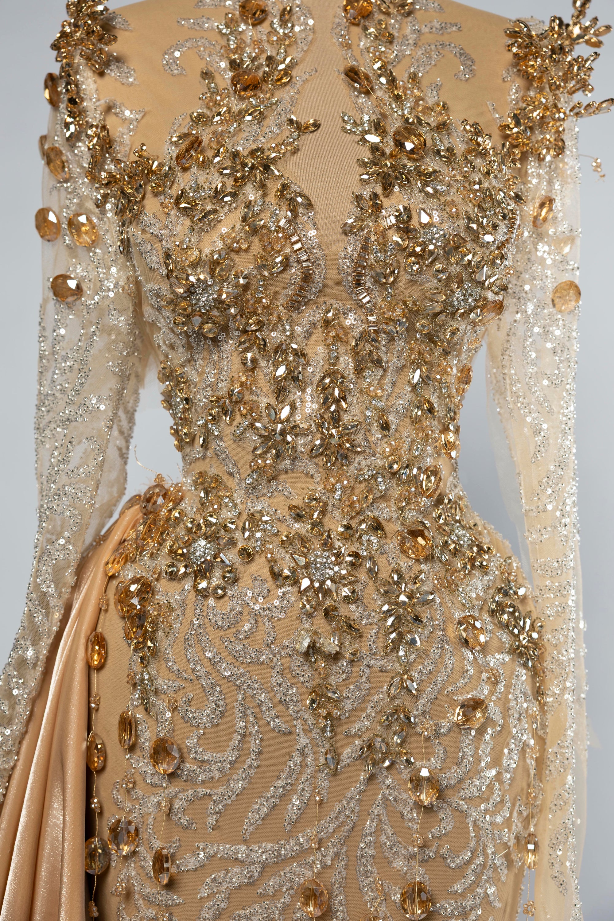 Sihëna Desert Marquise — champagne high-neck long-sleeve column evening dress