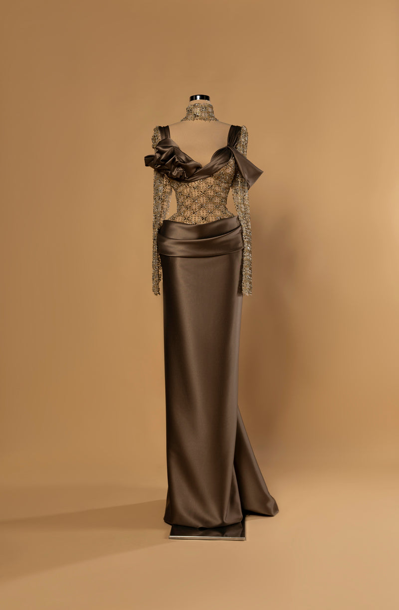 Sihëna Bronze Silk Sonata — bronze column gown with crystal-beaded sheer bodice, choker collar, draped satin skirt and 3D satin rosette.