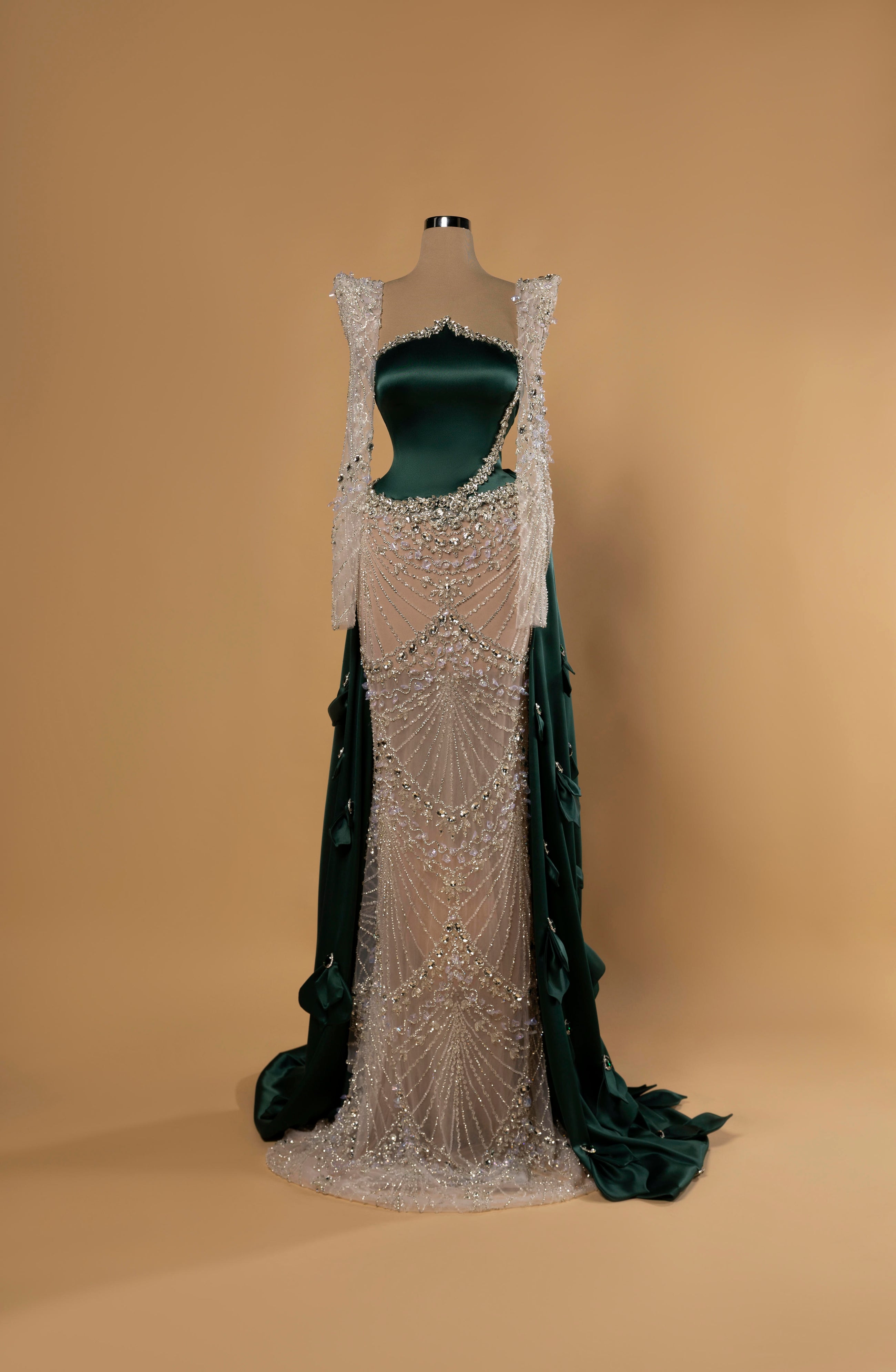 Sihëna Emerald Radiance — emerald strapless column gown in glossy satin with crystal-beaded illusion panels and beaded straps.