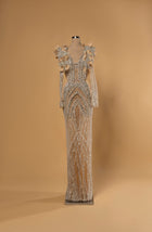 Sihëna Opaline Arches — nude deep-v long-sleeve column gown with arched crystal and pearl beadwork and 3D floral beaded shoulders.