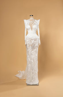 Sihëna Seraphine Lattice — ivory high-neck long-sleeve mermaid bridal gown in lace with pearl-feather 3D-florals and beaded illusion skirt.