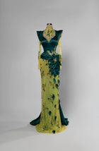 Sihëna Citrine Canopy — emerald high-neck long-sleeve mermaid evening gown in satin with crystal yoke and citrine sheer beaded skirt.