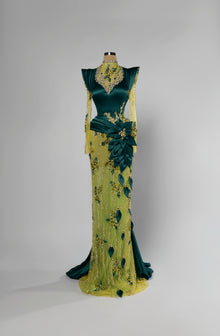 Sihëna Citrine Canopy — emerald high-neck long-sleeve mermaid evening gown in satin with crystal yoke and citrine sheer beaded skirt.