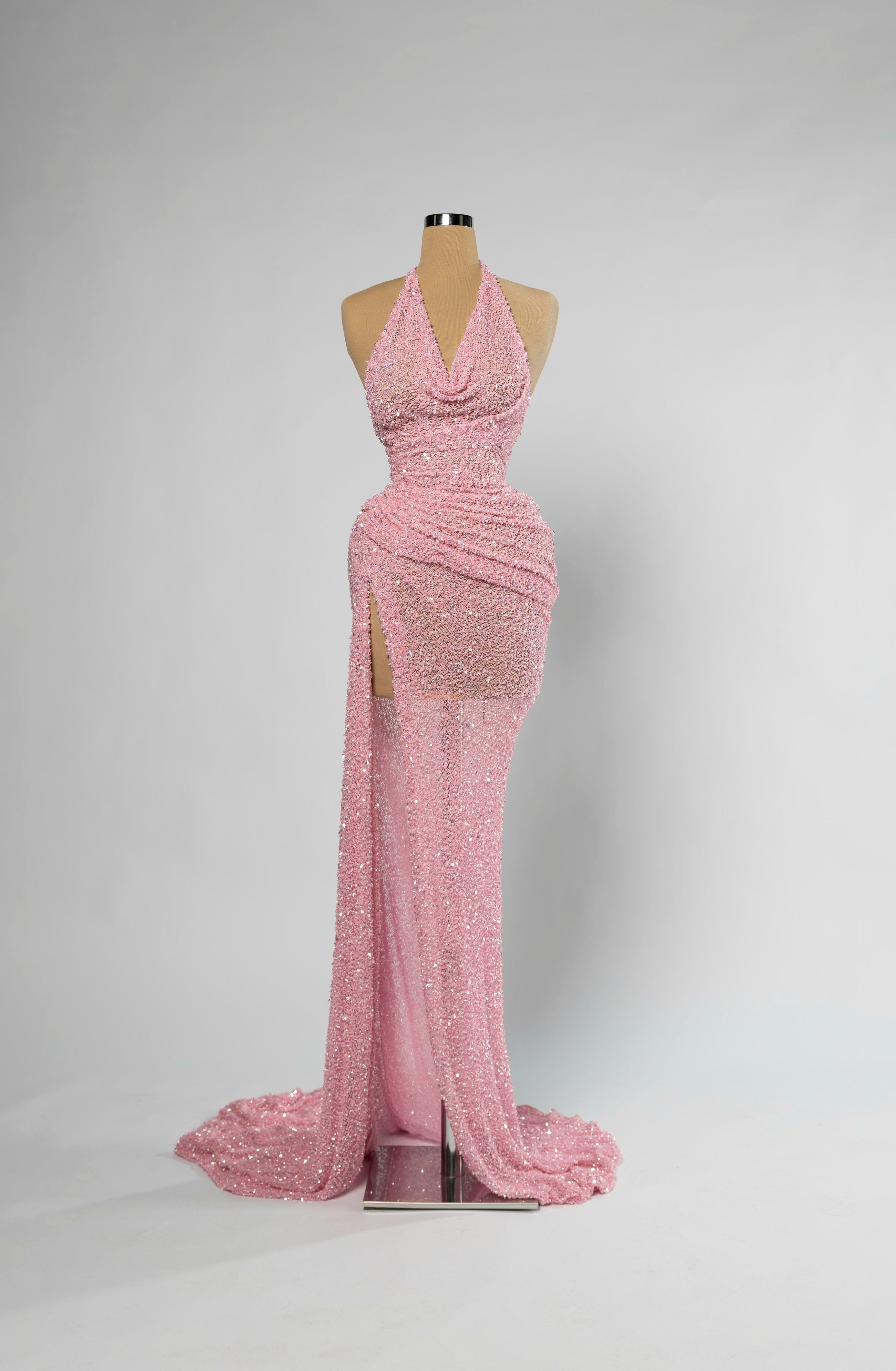Sihëna Peony Luster — pink halter cowl-neck sleeveless mermaid evening gown in sequins with draped high-slit skirt and train.