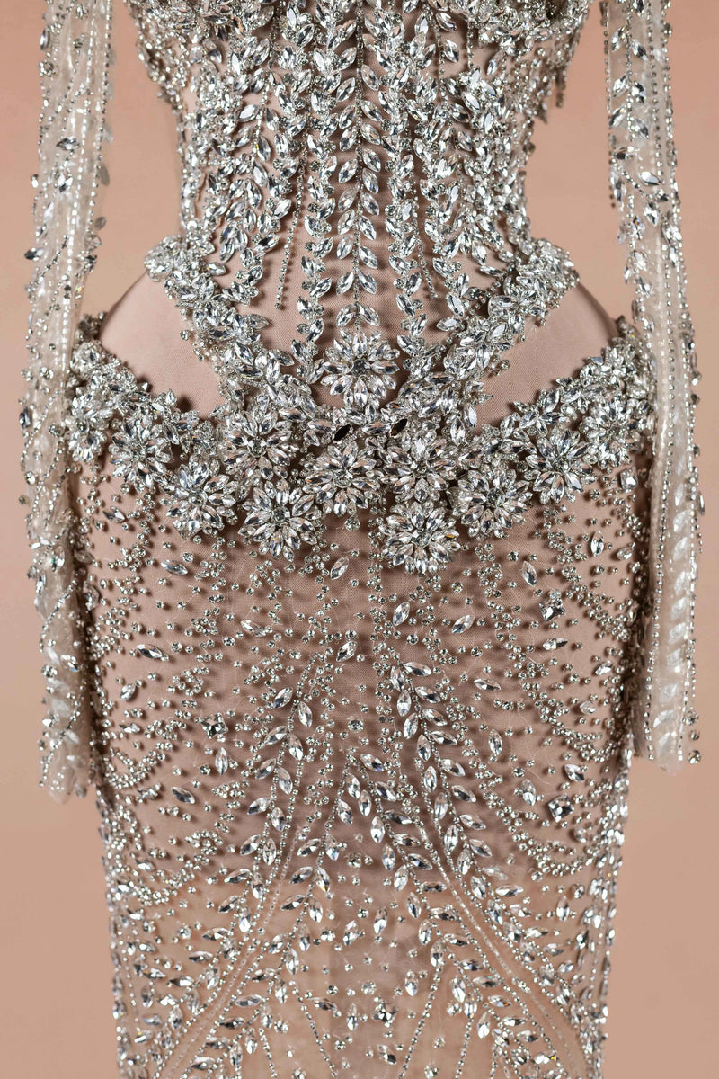 Sihëna Prismatic Cascade — silver high-neck long-sleeve column evening dress
