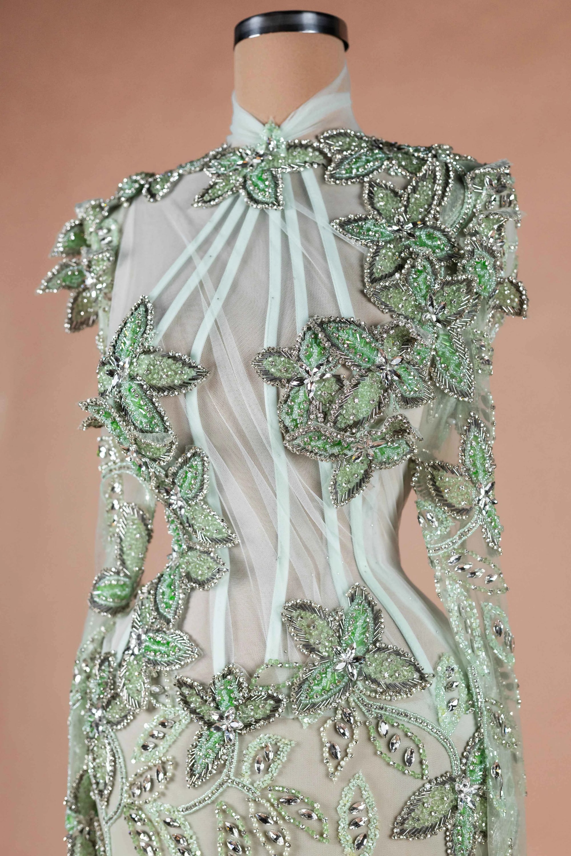 Sihëna Sage Ivy — sage-green high-neck long-sleeve column evening dress