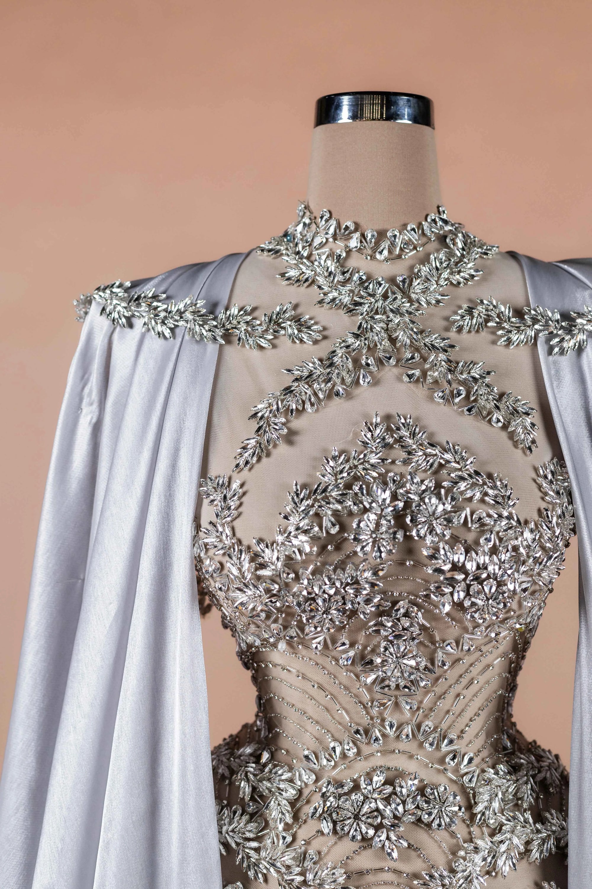 Sihëna Silver Reign — silver high-neck cape-sleeve column evening dress