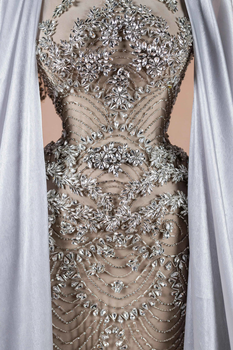 Sihëna Silver Reign — silver high-neck cape-sleeve column evening dress