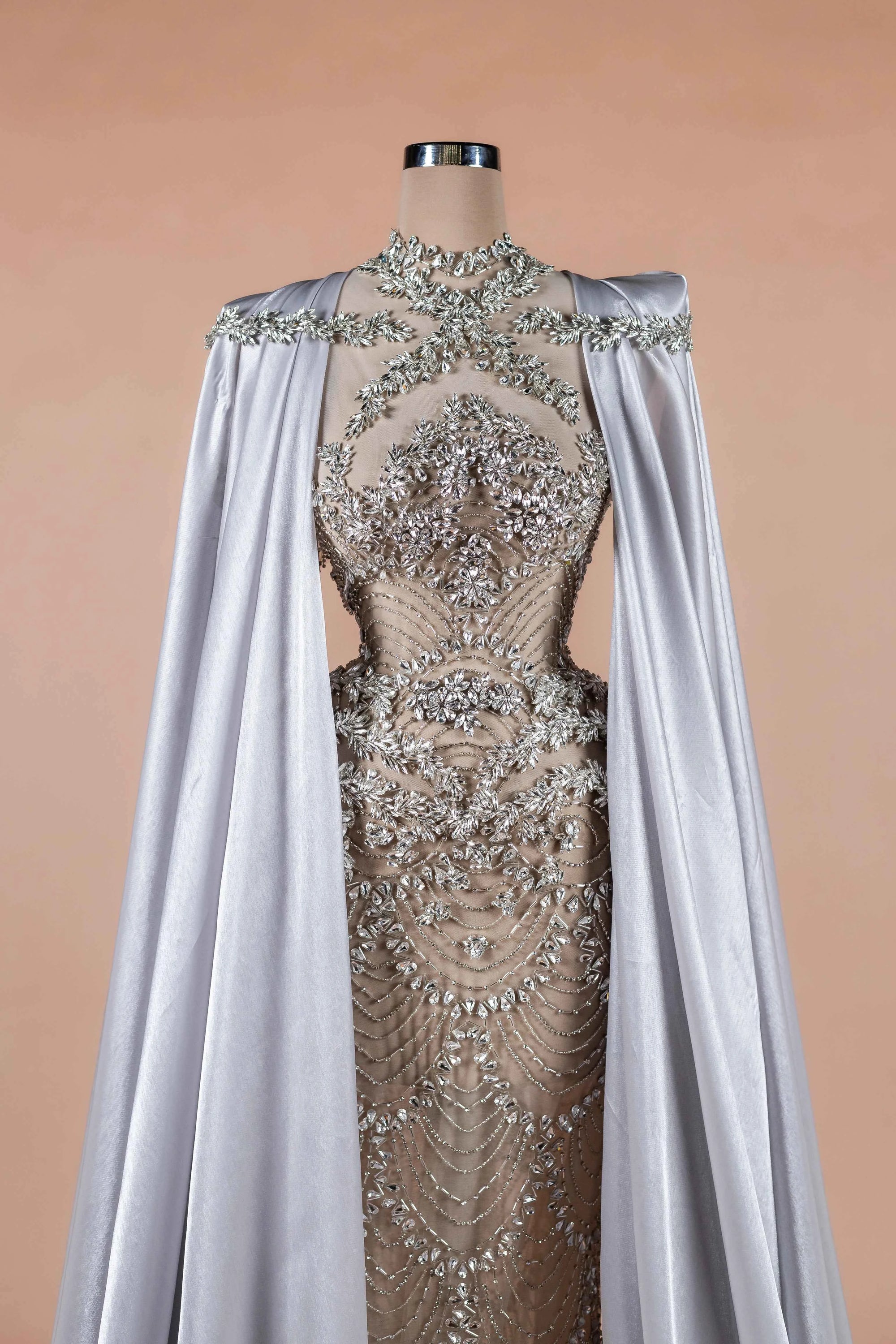 Sihëna Silver Reign — silver high-neck cape-sleeve column evening dress