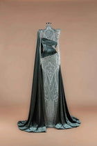 Sihëna Evergreen Citadel — emerald high-neck long-sleeve velvet gown with crystal-sequin panel, caped sleeves and corset midriff.