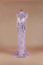 Sihëna Wisteria Vine — lilac high-neck long-sleeve velvet mermaid gown with crystal-bordered chest cutout and beaded vine motif.