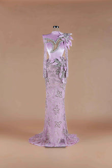 Sihëna Wisteria Vine — lilac high-neck long-sleeve velvet mermaid gown with crystal-bordered chest cutout and beaded vine motif.