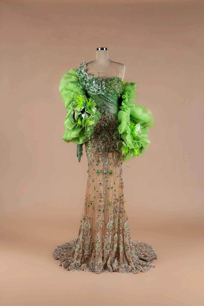 Sihëna Jade Opulence — lime one-shoulder mermaid gown with green crystal beadwork, organza ruffle wraps and satin bows.