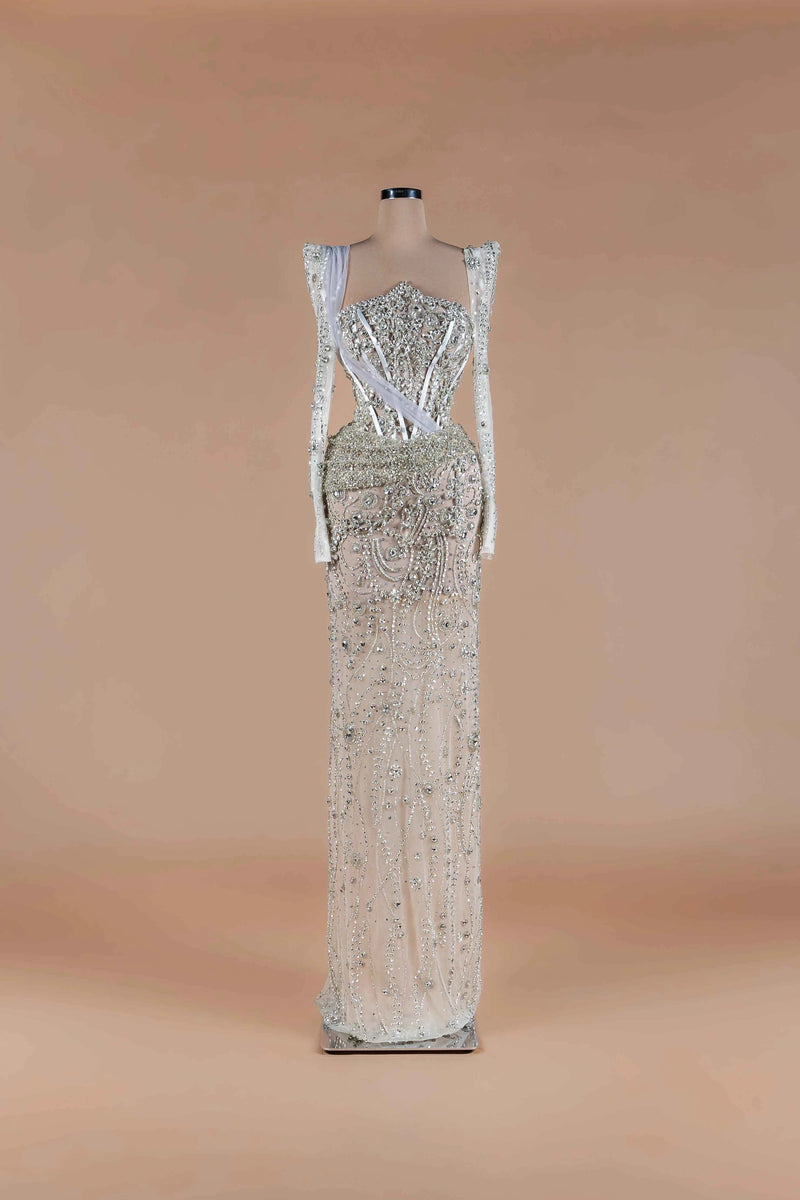 Sihëna Diamond Reverie — silver sweetheart long-sleeve column gown with crystal corset bodice and all-over beadwork.
