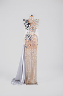 Sihëna Mirrored Pearl Marquee — silver high-neck long-sleeve gown with pearl drapes, mirrored metallic florals and satin overskirt.