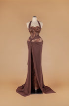 Sihëna Cocoa Veil — mocha halter sleeveless mermaid gown with sheer beaded lace corset, bronze sequins, chiffon drape and high slit.