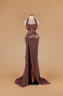 Sihëna Cocoa Veil — mocha halter sleeveless mermaid gown with sheer beaded lace corset, bronze sequins, chiffon drape and high slit.