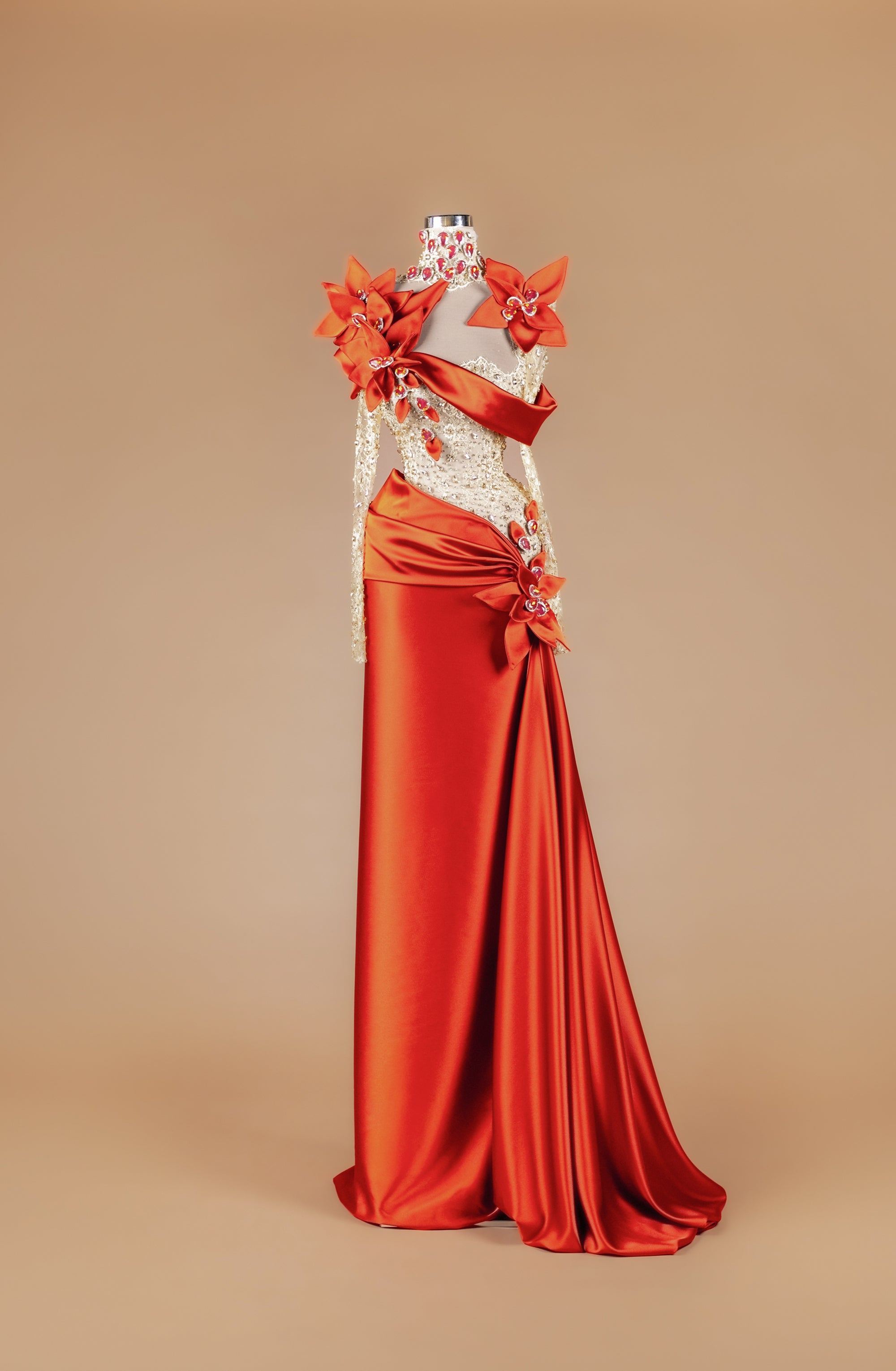 Sihëna Solar Blossom — marigold high-neck long-sleeve mermaid gown with satin 3D floral, crystal-beaded sheer bodice and draped satin sash train.
