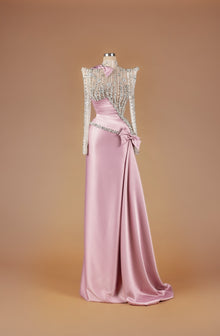 Sihëna Opaline Ribbon Sonnet — blush high-neck long-sleeve A-line gown with crystal and pearl beaded sheer bodice, satin bow and draped satin train.