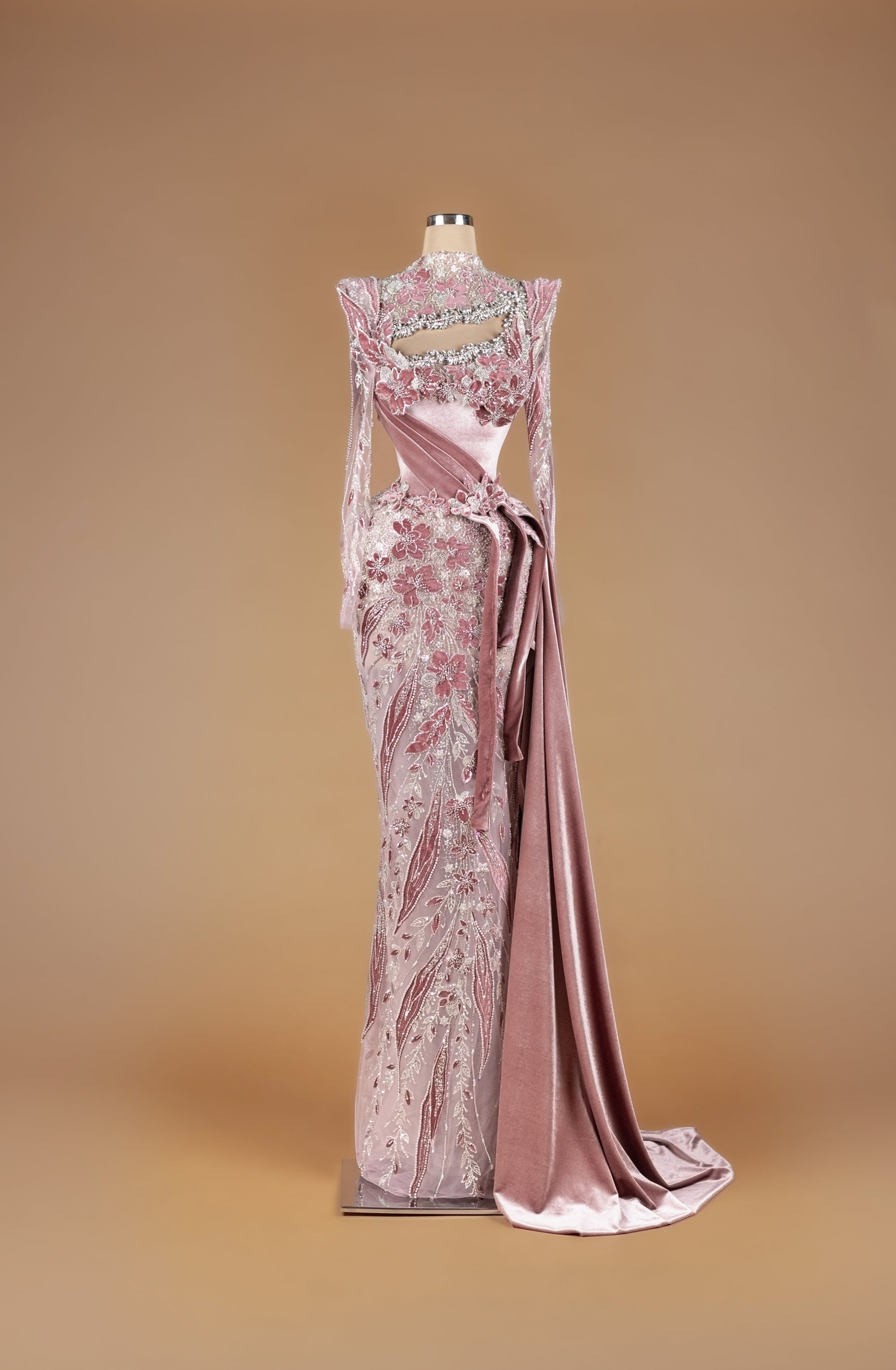 Sihëna Petal Script Sonata — dusty-rose high-neck long-sleeve mermaid gown with 3D floral velvet appliqué, crystal beadwork and draped velvet sash train.