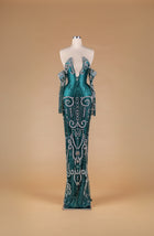 Sihëna Emerald Relic Radiance — emerald deep-v halter column gown with detached beaded sleeves and silver crystal scrollwork over emerald satin.
