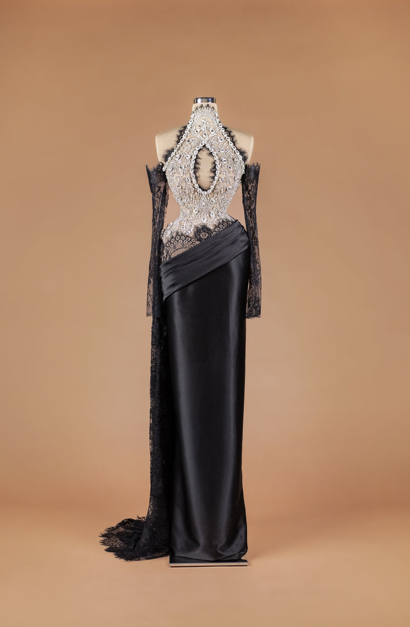 Sihëna Dawn Petal Lattice — black high-neck halter column gown with crystal-beaded keyhole bodice, detached black lace sleeves and draped satin skirt.