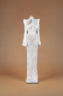 Sihëna Rosy Petal Tapestry — ivory high-neck long-sleeve lace column gown with 3D floral appliqué, cascading pearls and asymmetric keyhole cutout.