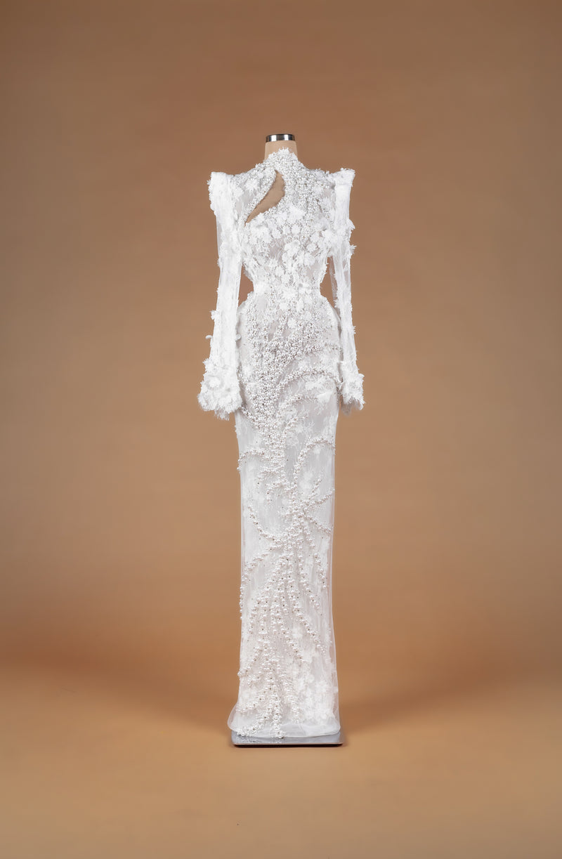 Sihëna Rosy Petal Tapestry — ivory high-neck long-sleeve lace column gown with 3D floral appliqué, cascading pearls and asymmetric keyhole cutout.
