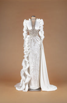 Sihëna Dusty Rose Embrace — ivory plunge v-neck long-sleeve mermaid gown with crystal and pearl beadwork, ruffled sleeves and satin overskirt train.